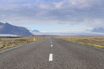 Road in the south of Iceland, on a summer day with blue sky