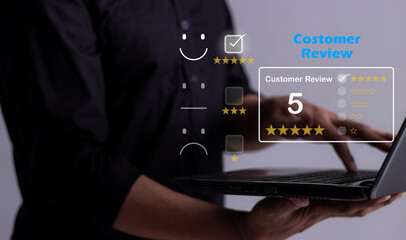 Customer Review, Young Man hand uses laptop to review and give 5 stars with very good results in service, Good review 5 star rating choice feedback