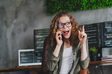 Photo of lovely glad successful woman system administrator expert chief work modern workstation...
