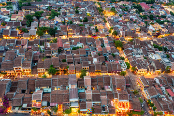 Fototapeta premium Aerial drone view of Hoi An city, Vietnam. Ancient town, UNESCO world heritage, at Quang Nam province.