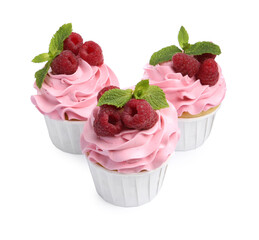 Tasty cupcakes with raspberries and mint isolated on white