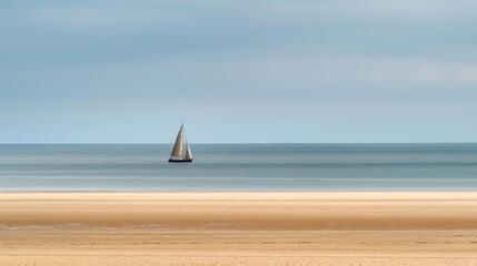 Obraz premium Sailboat on a Calm Sea and Sandy Shore