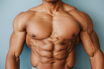 Athletic young adult male showcasing muscular physique