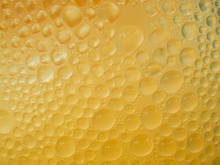 Drops of ice on an iced coffee glass
