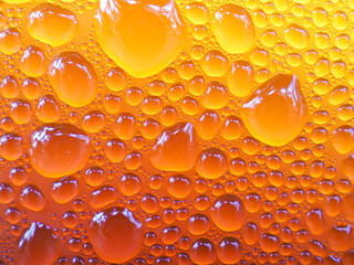 Drops of ice on an iced coffee glass
