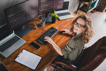 Photo of lovely confident successful professional woman sitting armchair comfortable workspace...