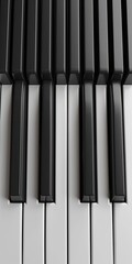 Close-up image of piano keys in black and white, showcasing the elegance and simplicity of a musical instrument.
