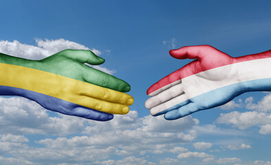 Luxembourg and Gabon country handshaking with flags, consensus concept international co-operation illustration