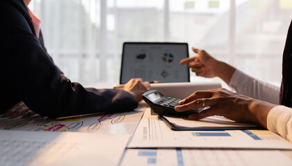 Business Mans and women discussing commercial real estate sector faces risks as financial.