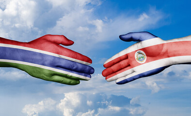 Costa Rico and Gambia country handshaking with flags, consensus concept international co-operation illustration