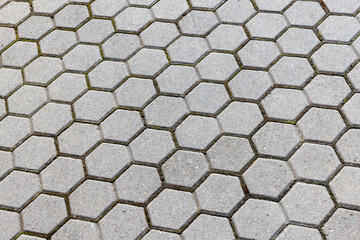 Gray concrete tiling background, hexagonal paving slabs