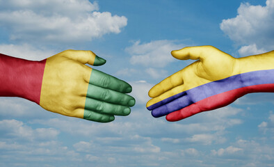 Colombia and  Guinea-Conakry country handshaking with flags, consensus concept international co-operation illustration