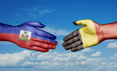 Belgium and Haiti country handshaking with flags, consensus concept international co-operation illustration