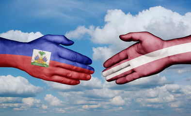 Latvia and Haiti country handshaking with flags, consensus concept international co-operation illustration