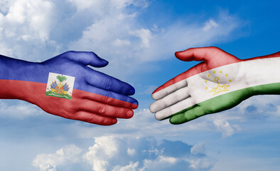 Tajikistan and Haiti country handshaking with flags, consensus concept international co-operation illustration