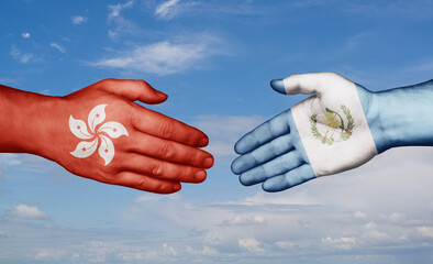 Guatemala and Hong Kong country handshaking with flags, consensus concept international co-operation illustration