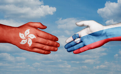 Slovenia and Hong Kong country handshaking with flags, consensus concept international co-operation illustration