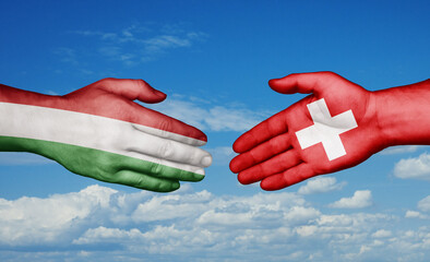 Switzerland and Hungary country handshaking with flags, consensus concept international co-operation illustration