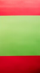 Naklejka premium Background image featuring a simple design of three sheets of paper, with the top and bottom sheets red and the middle sheet green