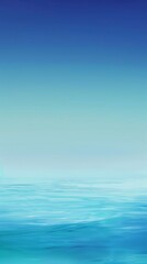 Endless expanse of calm, blue ocean water meets a serene, blue sky at the horizon, creating a tranquil and peaceful scene
