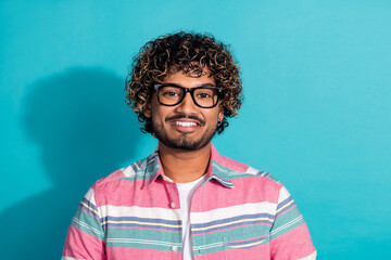 Photo of cheerful glad man wear stylish striped clothes eyewear isolated on cyan color background