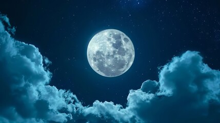 A full moon is seen in the night sky with clouds.