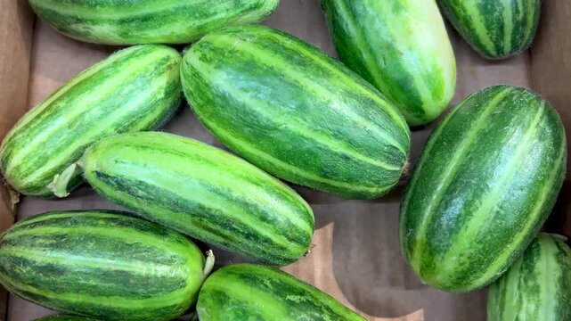 Meloncella del Salento in crate, the meloncella is a hybrid of melon and cucumber. Slider shots in top view