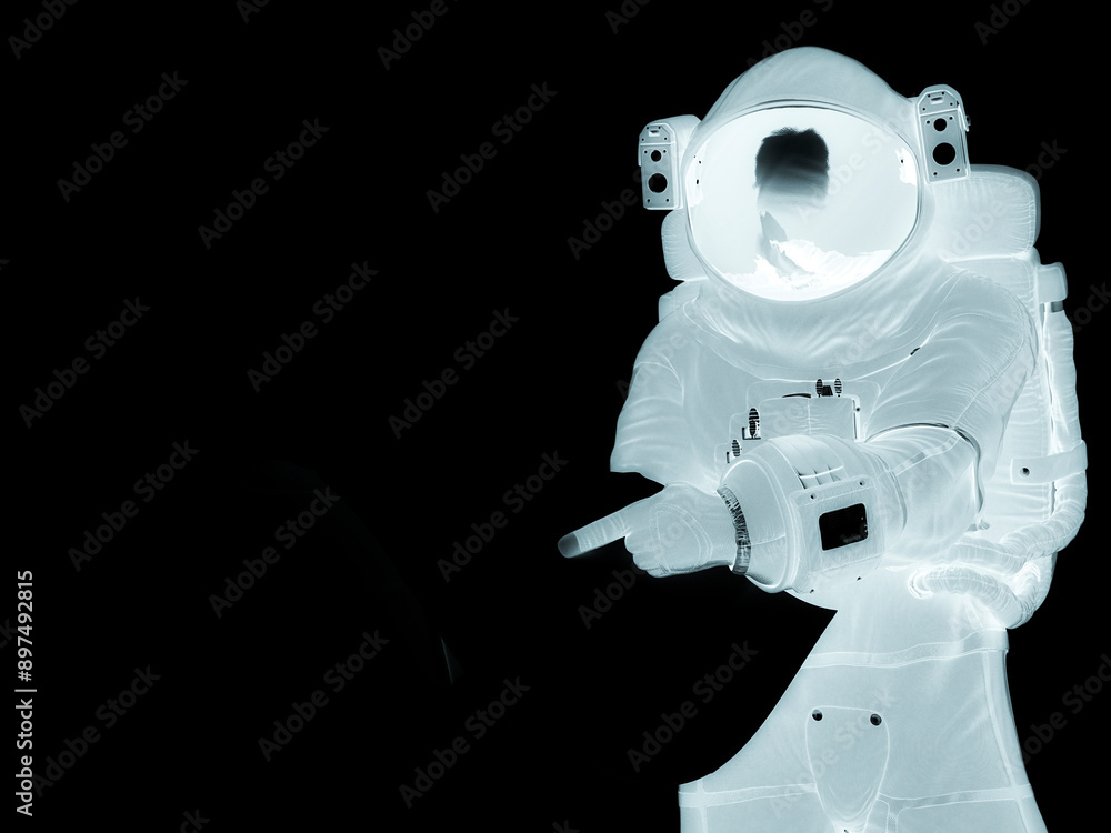 Wall mural astronaut lost and trying to read a map