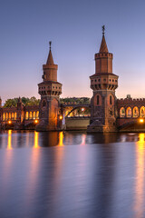 Fototapeta premium The beautiful Oberbaumbruecke over the river Spree in Berlin at twilight
