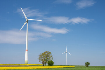 Fototapeta premium Rural landscape with wind turbines seen in Germany