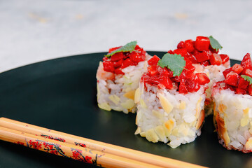 Sushi Rolls Topped With Fresh Strawberries