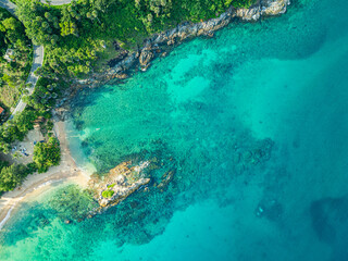 aerial top view above small island in front of Yanui beach in low tide. Sand dunes in the separate sea. Sandbars form in the Separated Sea when the water level goes down. green sea white sand beach.