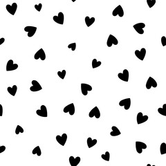 All over seamless vector repeat pattern with ditsy small black hand drawn doodle hearts tossed on white background. Simple cute Valentines day background