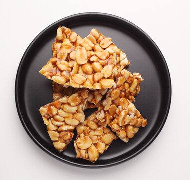 Peanut chikki candy gajak Diwali sweets Indian Sweet dessert mithai festival dish Dussehra Holi ganesh chaturthi Ram navami Durga pooja, durga ashtami Navratri