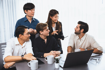 Group of diverse office worker employee working together on strategic business marketing planning in corporate office room. Positive teamwork in business workplace concept. Prudent