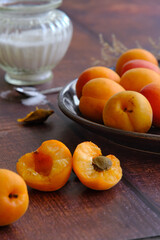 yellow ripe apricots on a plate