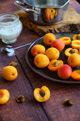 yellow ripe apricots on a plate