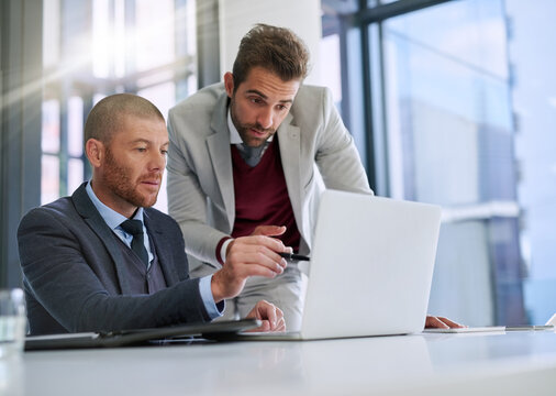 Business people, discussion and online with laptop in office, planning and conversation for problem solving. Task force, corporate team and internet for risk assessment and stakeholder communication.