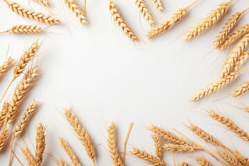 Wheat frame on white table viewed from top