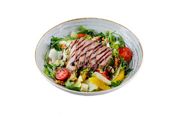 Salad with duck, oranges, and unagi sauce on a white background. isolate. for food delivery menus