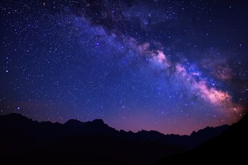 Fototapeta premium Starry sky, Milky Way, night view of the desert with distant mountains in silhouette