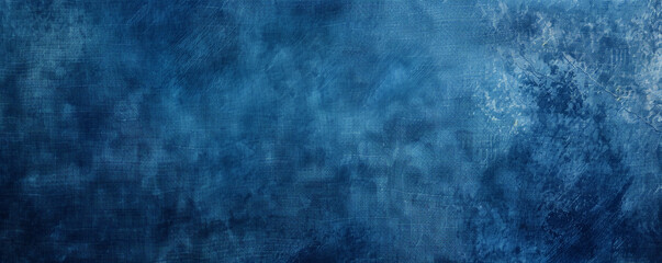 Obraz premium A deep blue background with a slight gradient and a rough texture, adding a sense of ruggedness and character.