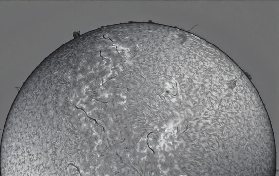 The surface of the sun in black and white with an h-alpha telescope Coronado Solarmax III 70 double stacked.