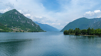Scenic Serenity: Lago d'Idro Surrounded by Rugged Mountain Peaks