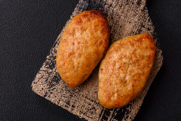 Delicious fresh fried minced fish cutlets with spices and herbs