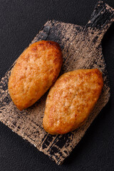 Delicious fresh fried minced fish cutlets with spices and herbs