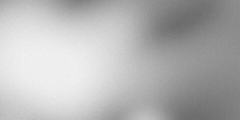 Obraz premium Grainy textured light gray background with abstract interplay of light and shadow