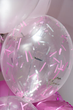 clear balloon with confetti