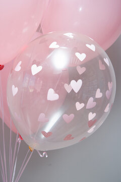 clear balloon with confetti