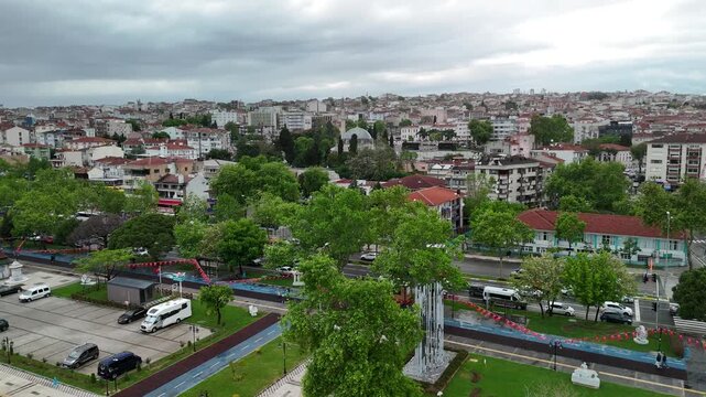 Tekirdag city with the road traffic and urban buildings with green trees and parking lot in Turkey